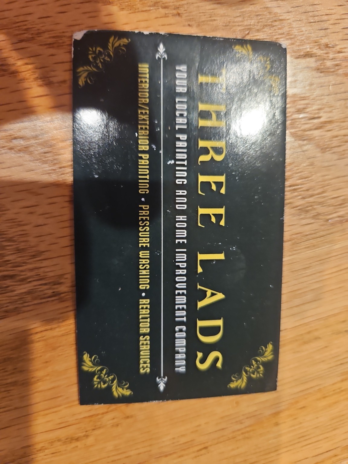 Three Lads painting brand card