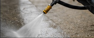 Pressure washing a hard surface